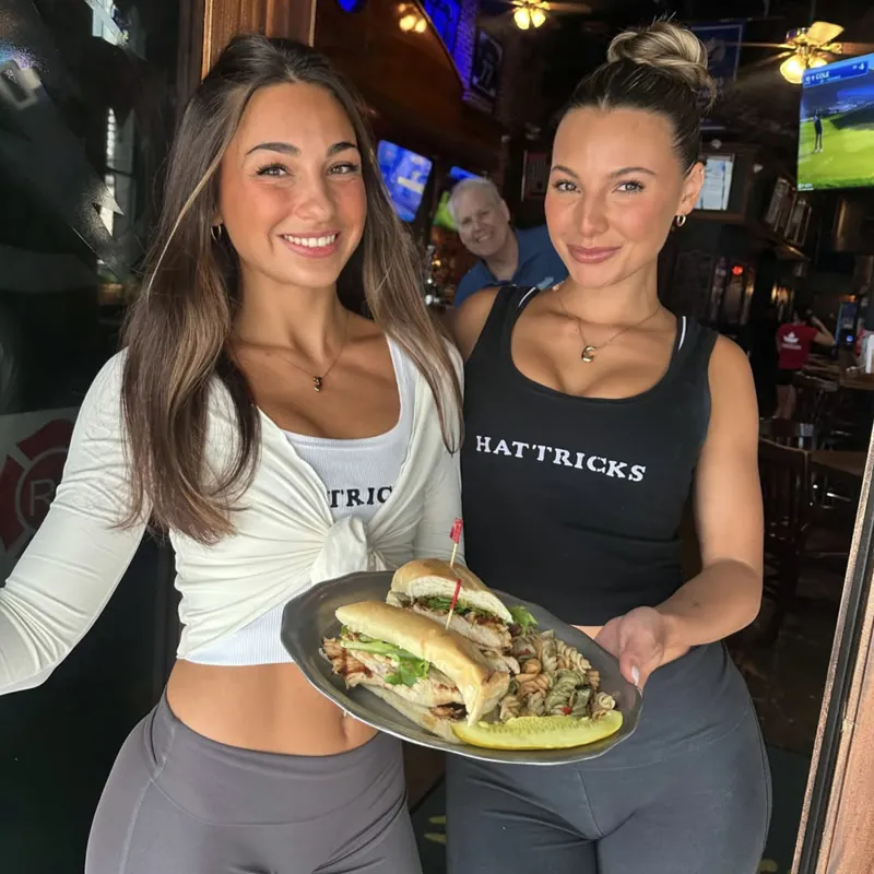 Two Hattricks servers with a chicken pesto hoagie